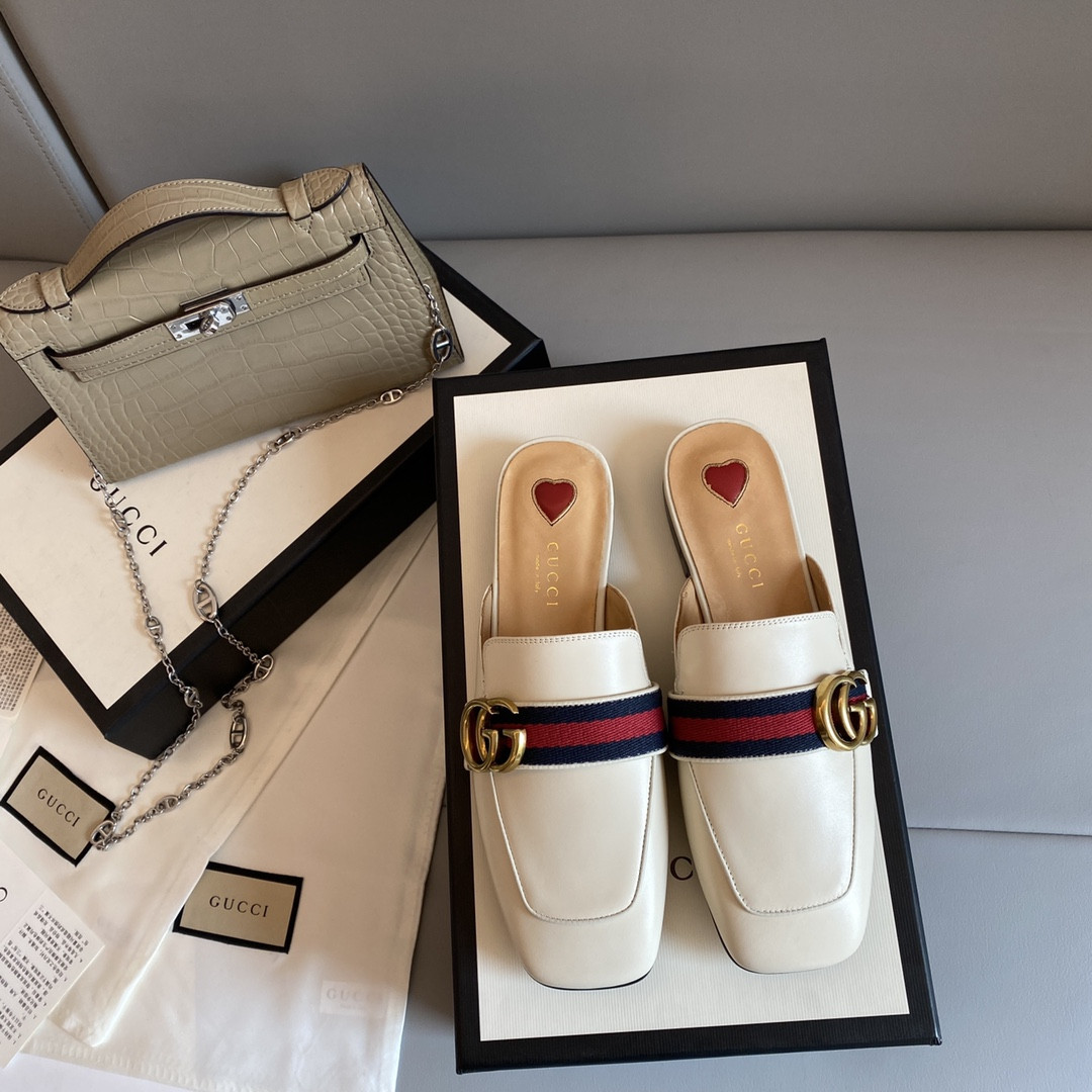G*u*i leather slippers